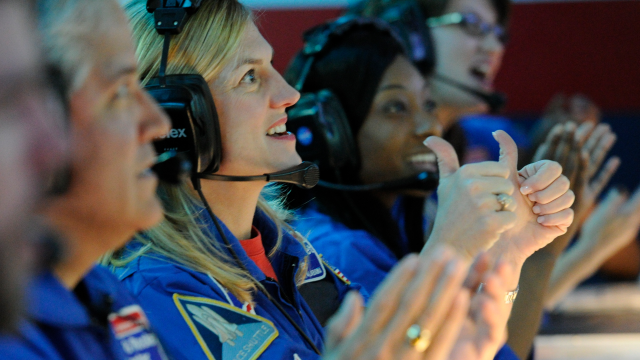 Campers in Mission Control celebrate the success of mission completion